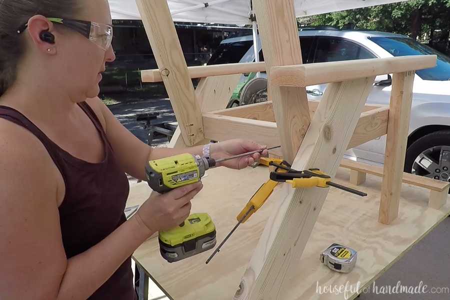 Attaching the seat back to the lounge chairs. 