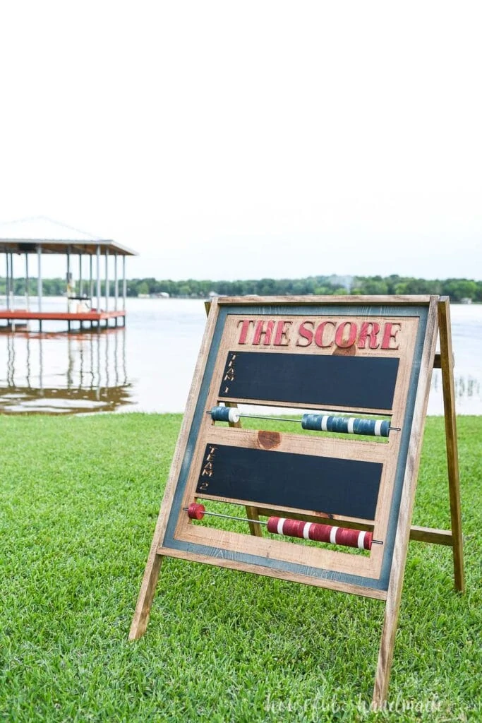 DIY scoreboard made from wood on the lawn. 