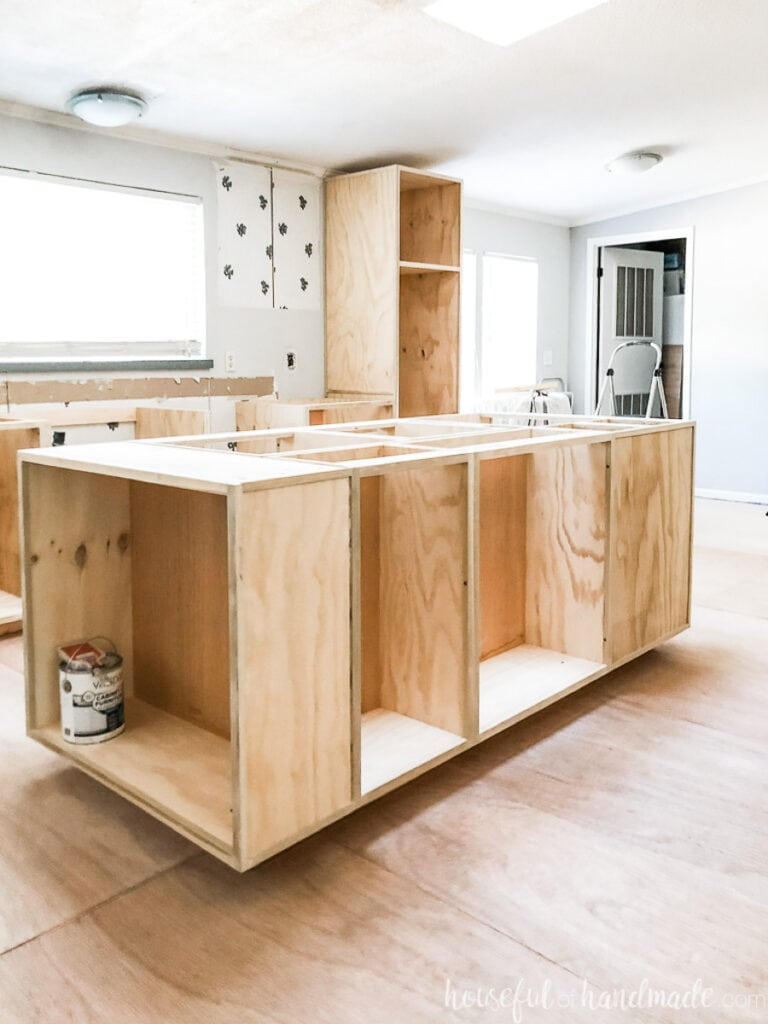 DIY kitchen cabinets installed in the kitchen before paint. 