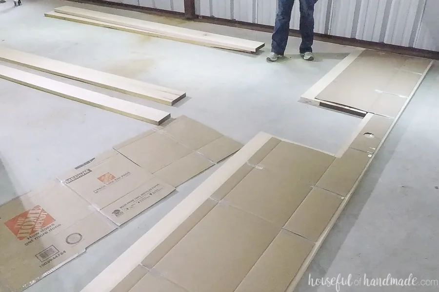 Laying out the boards out under the cardboard template. 