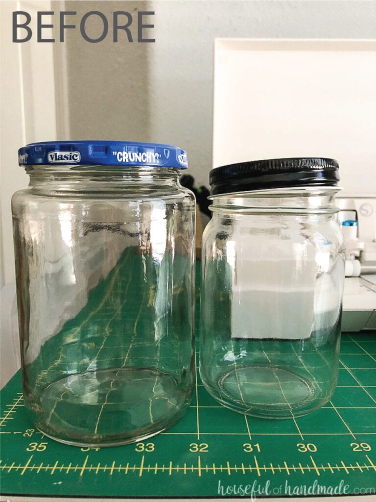 Two empty food jars cleaned of the labels to make a craft with.