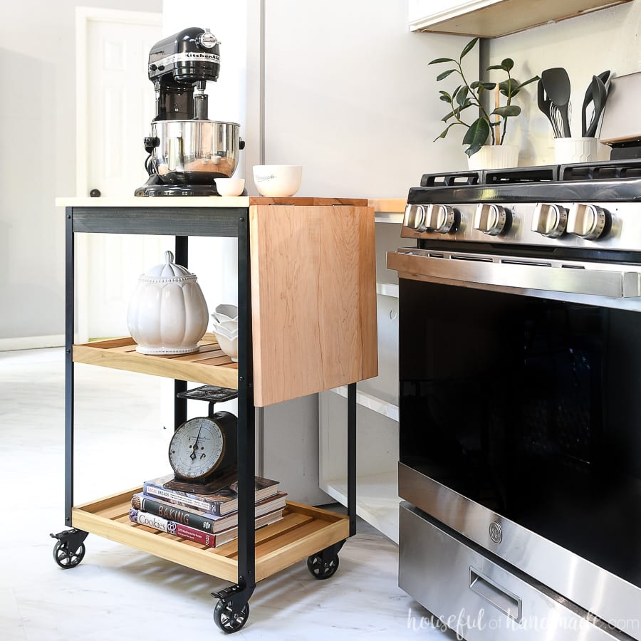 Modern kitchen cart on wheels with a drop down leaf for more counter space when you need it.