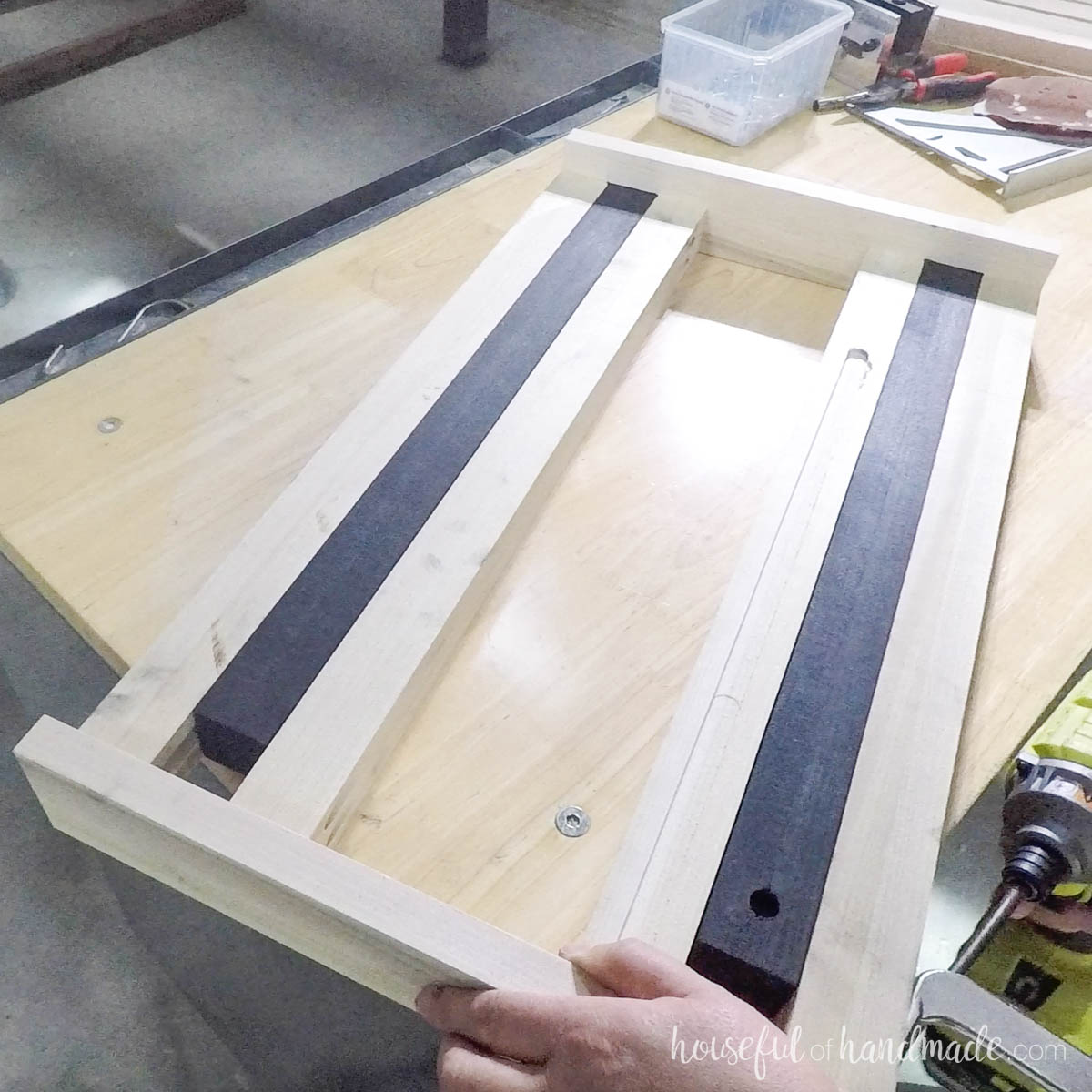 Inserting leaf support and adding the remaining boards to close it in. 