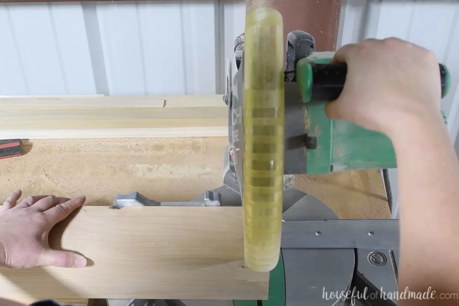 Cutting a 4x4 board on the miter saw.