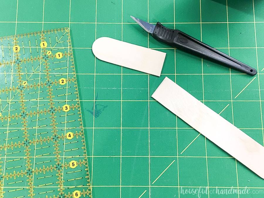 A quart stir stick cut with an x-acto knife.