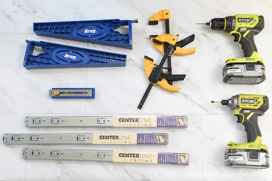 Tools needed to install cabinet drawers with ball bearing drawer slides on a marble vinyl floor.