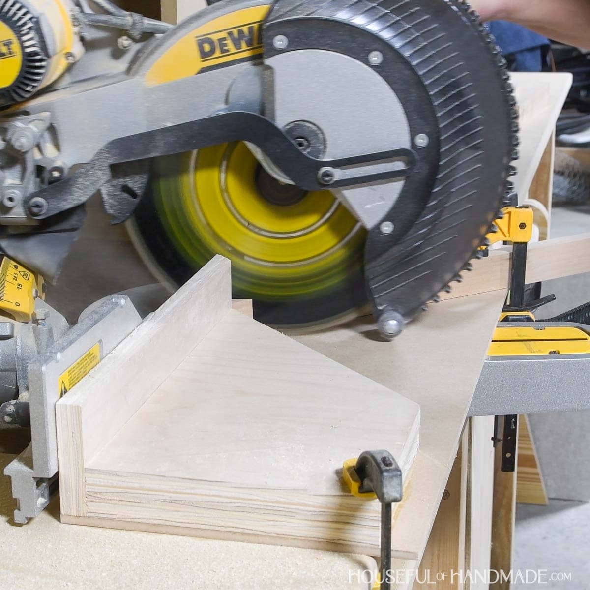 Cutting a 60 degree angle with an acute angle jig on the miter saw. 