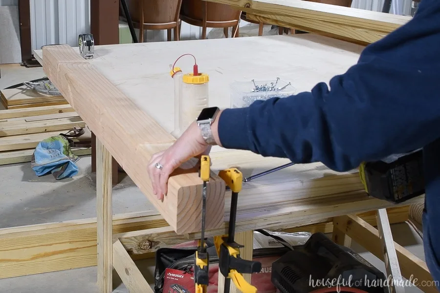 Attaching the top 2x8 board for the headboard with pocket holes. 