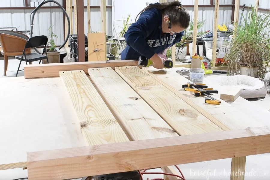 Attaching the second leg to the headboard with pocket holes. 