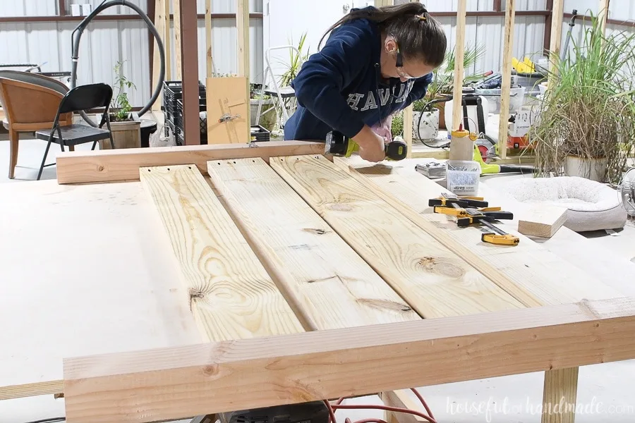 Attaching the second leg to the headboard with pocket holes.