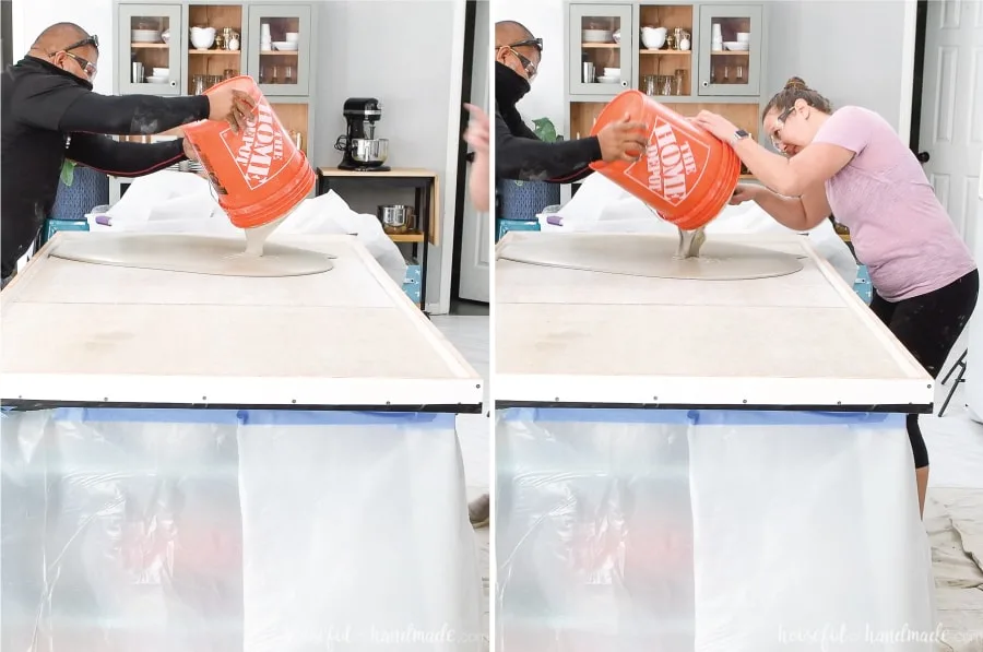 Pouring the first bucket of mixed concrete into the forms on the kitchen island and scraping the concrete out with a float.