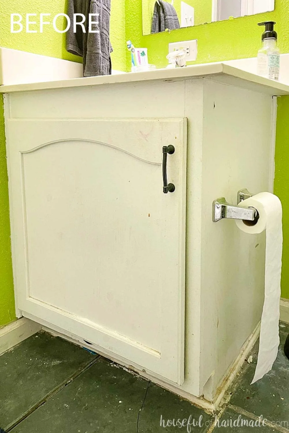 Close up of the current bathroom vanity in the bathroom that needs a makeover.