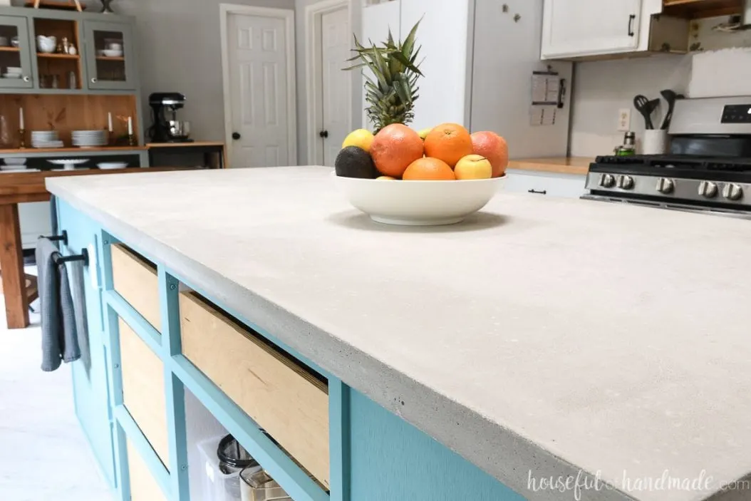 Side view of the kitchen with the natural colored concrete countertop. 