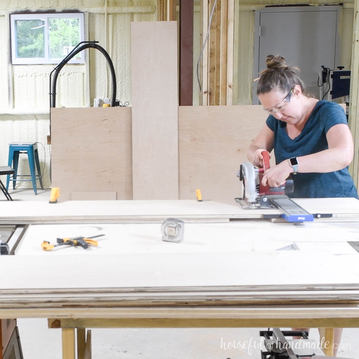 Cross cutting the plywood strips for the cabinet sides. 