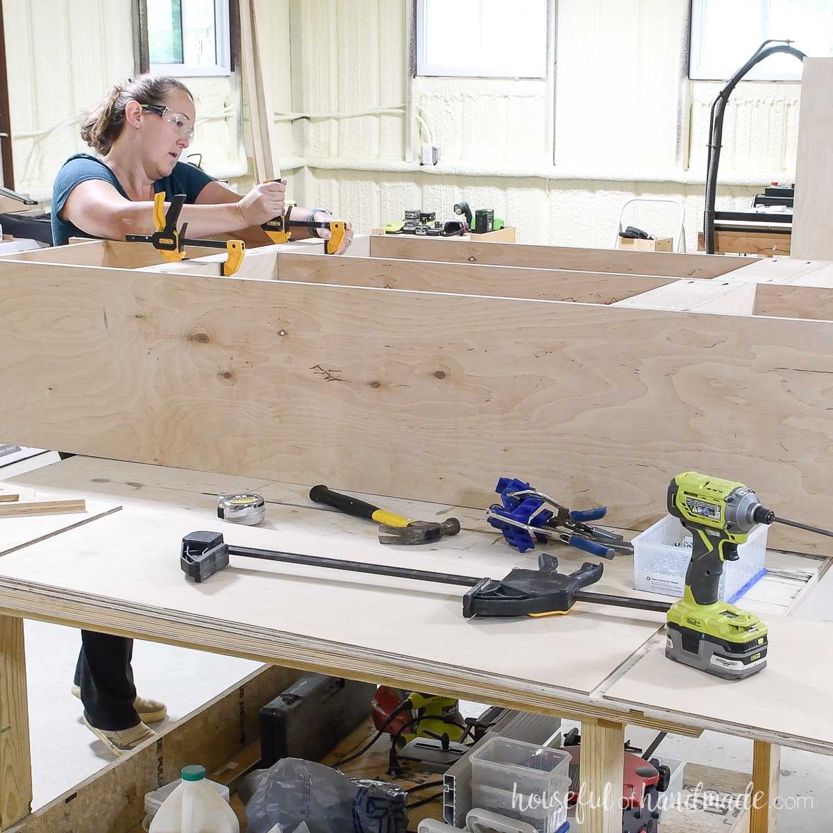 Attaching the second locker section to the first and securing with pocket holes.