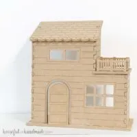 Flat-pack dollhouse made with a CNC machine.