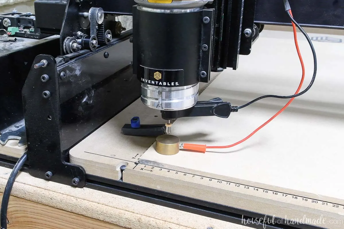 Using the z-probe to set up the x-carve to carve details on the dollhouse with a v-bit.