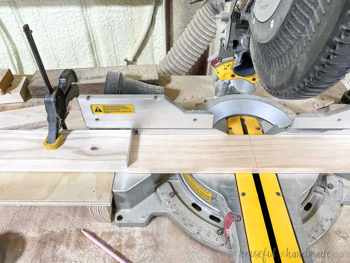 Using a board clamped next to the miter saw as a cutting guide. 