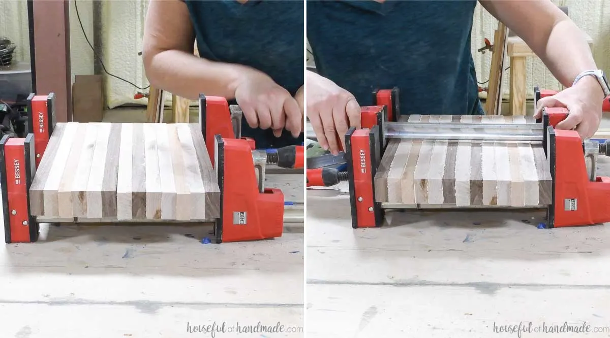 Clamping together the cutting board boards for the glue to dry.