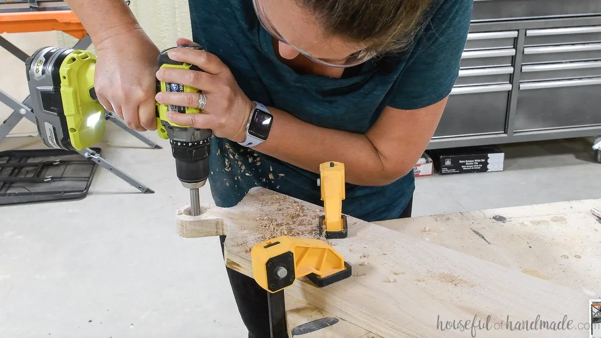 Drilling a hole in the breadboard handle with a forstner bit. 