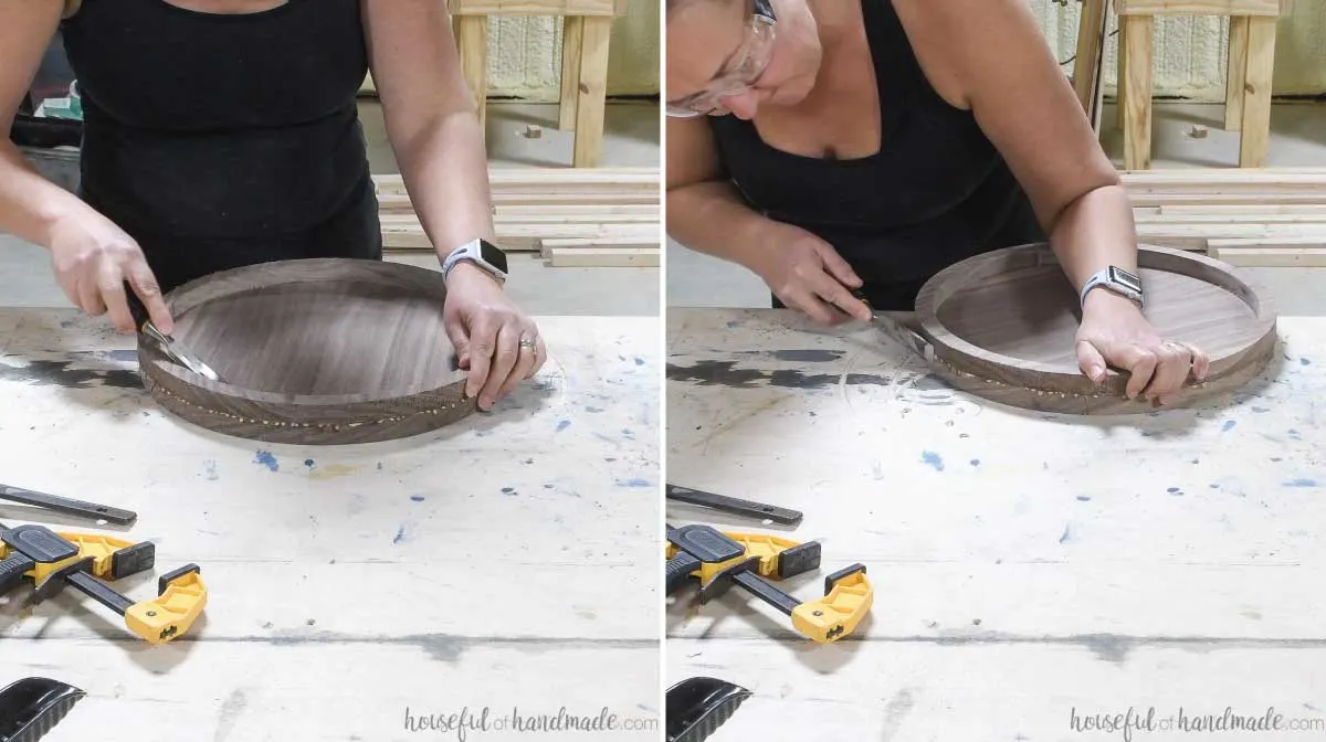 Removing the glue squeeze out from the round tray with a chisel. 