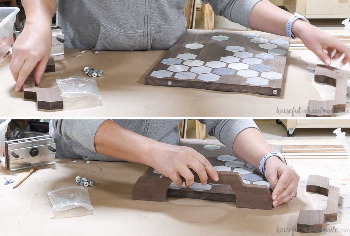 Using dowel points to mark the second placing for the adjoining hole on the tray handles. 