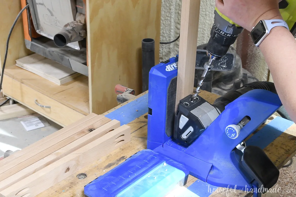 Drilling pocket holes with the Kreg jig.