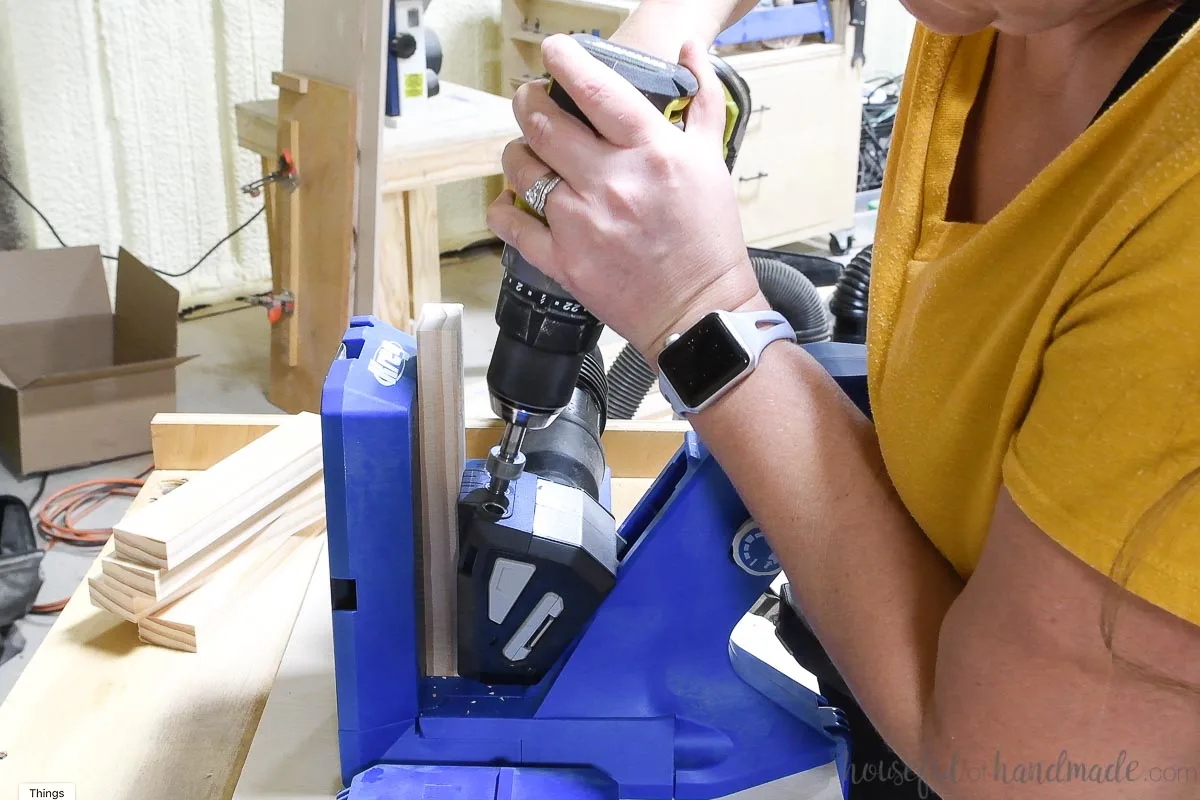 Drilling pocket holes with the Kreg 720Pro jig. 