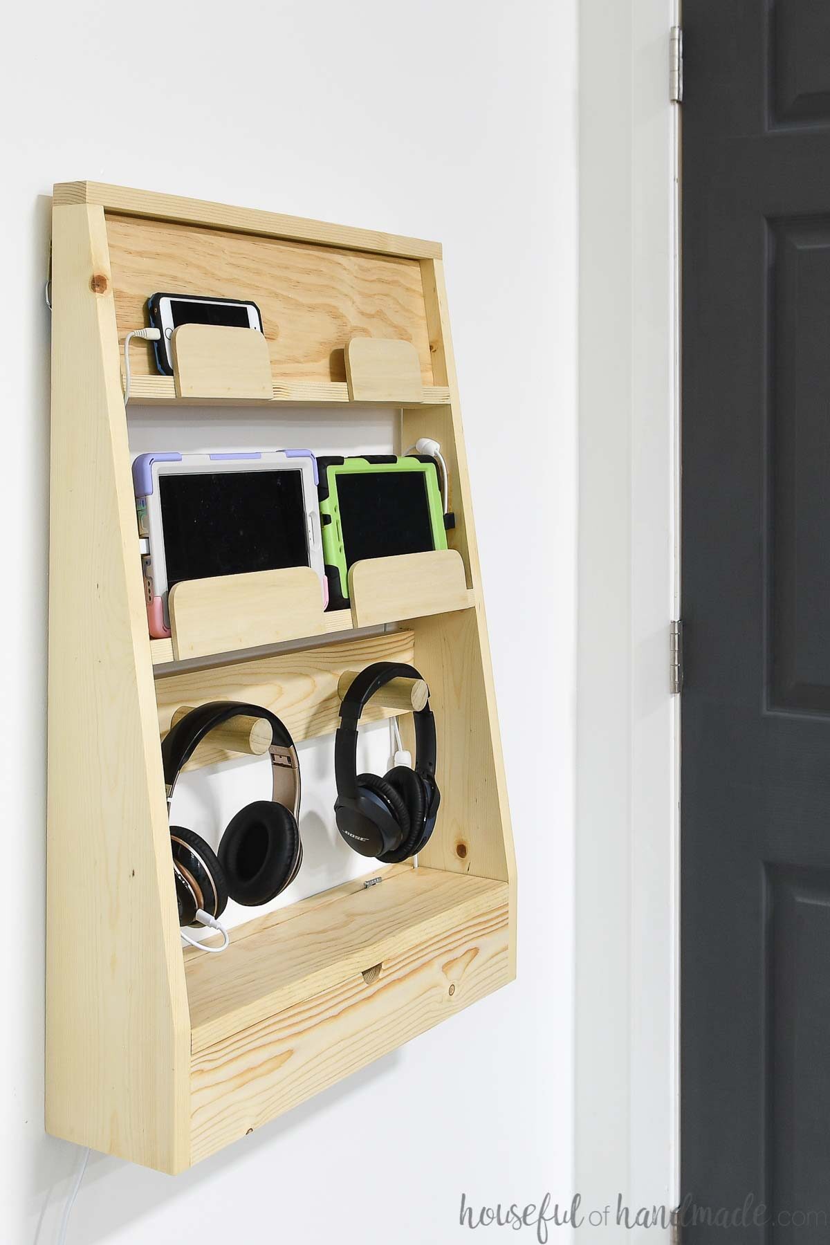 Side view of the wall mounted charging station for phones and tablets. 
