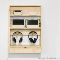 DIY charging station for kids phones and tablets with a space for charging bluetooth headsets.