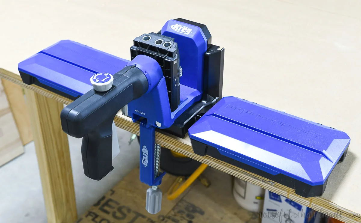 520 Kreg jig in the docking station on a workbench. 