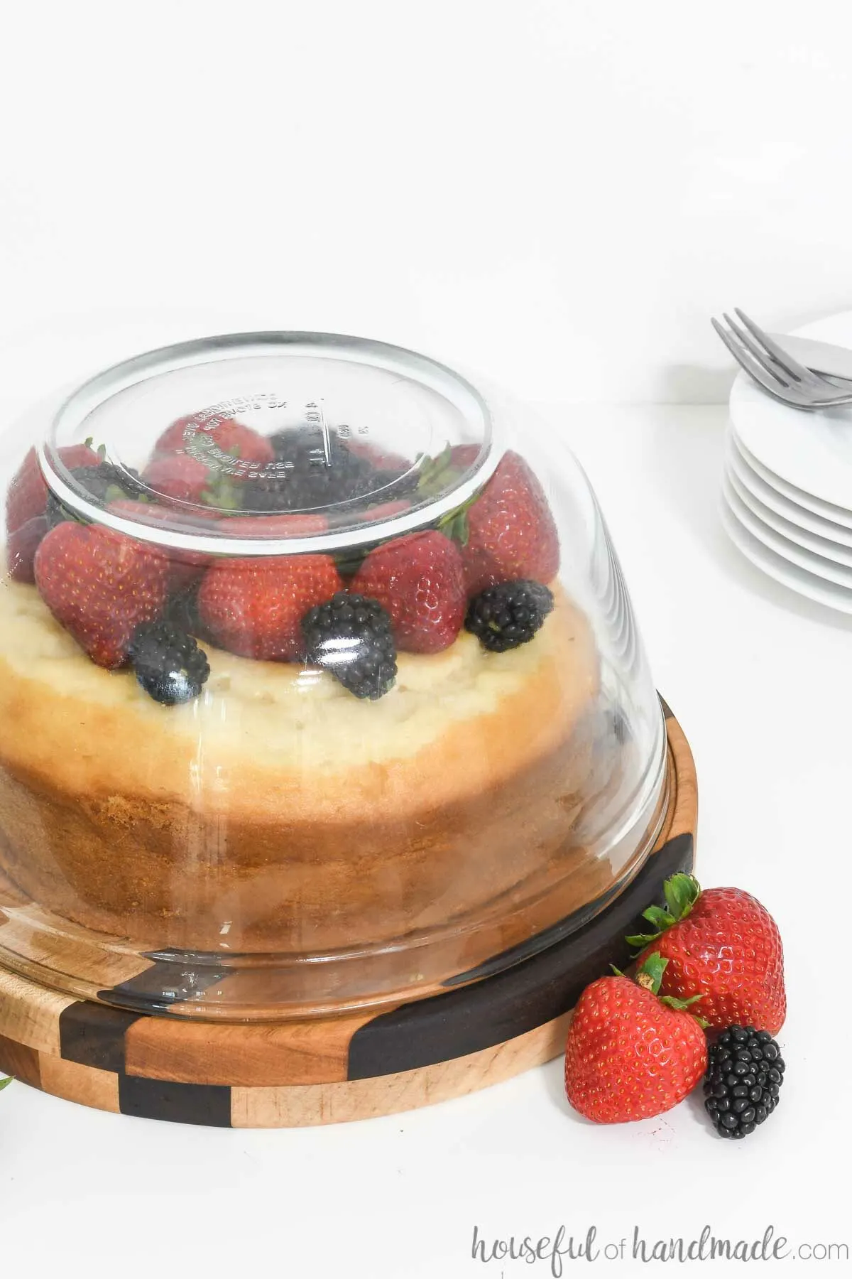 Glass bowl used as a dome for the DIY cake stand made from small strips of wood. 