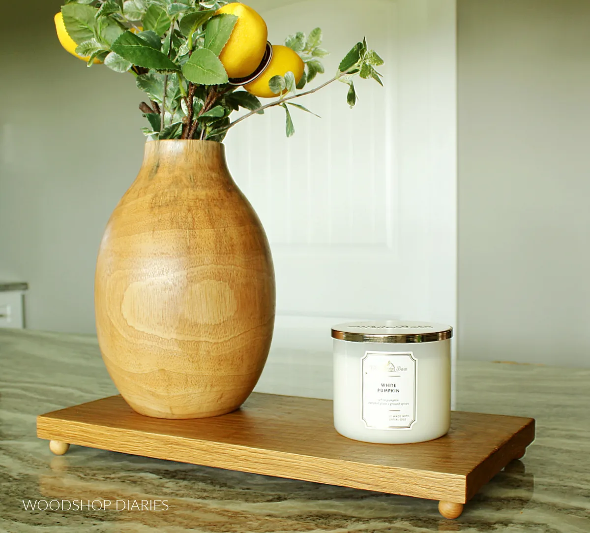 DIY footed tray on countertop from Woodshop Diaries. 
