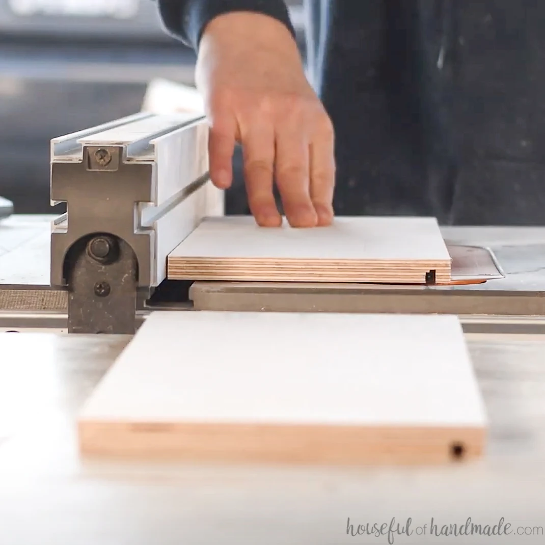 Cutting a groove for a bottom panel in a drawer with a table saw. 
