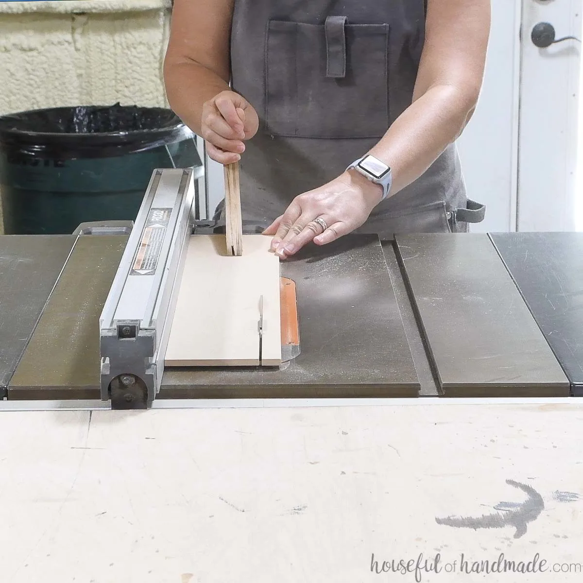 Cutting a strip of 1/4" MDF on a table saw. 