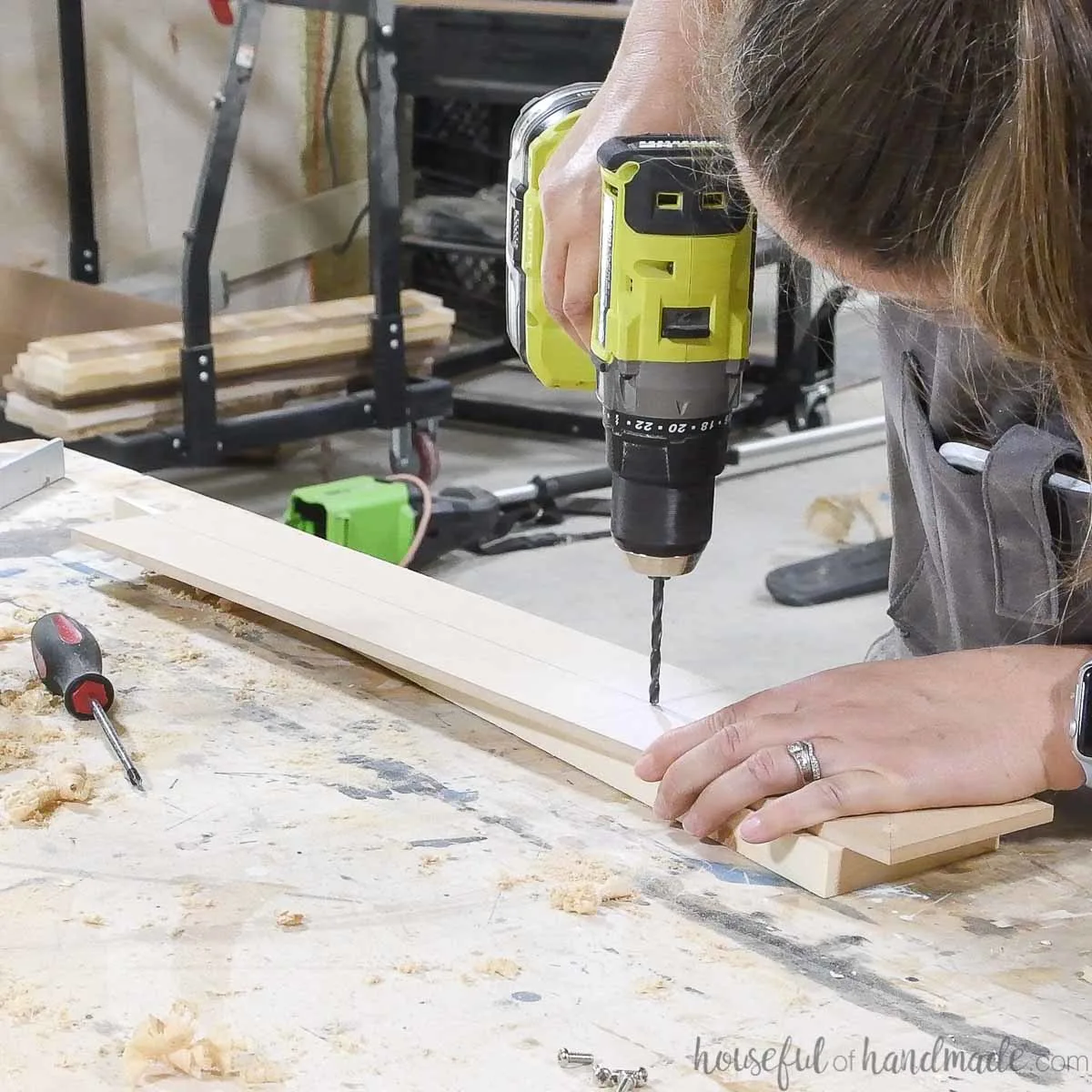 Drilling a hole for the shelf pin. 