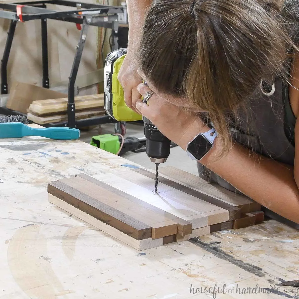 Drilling a hole in the center of the glued together base for a circle router jig. 