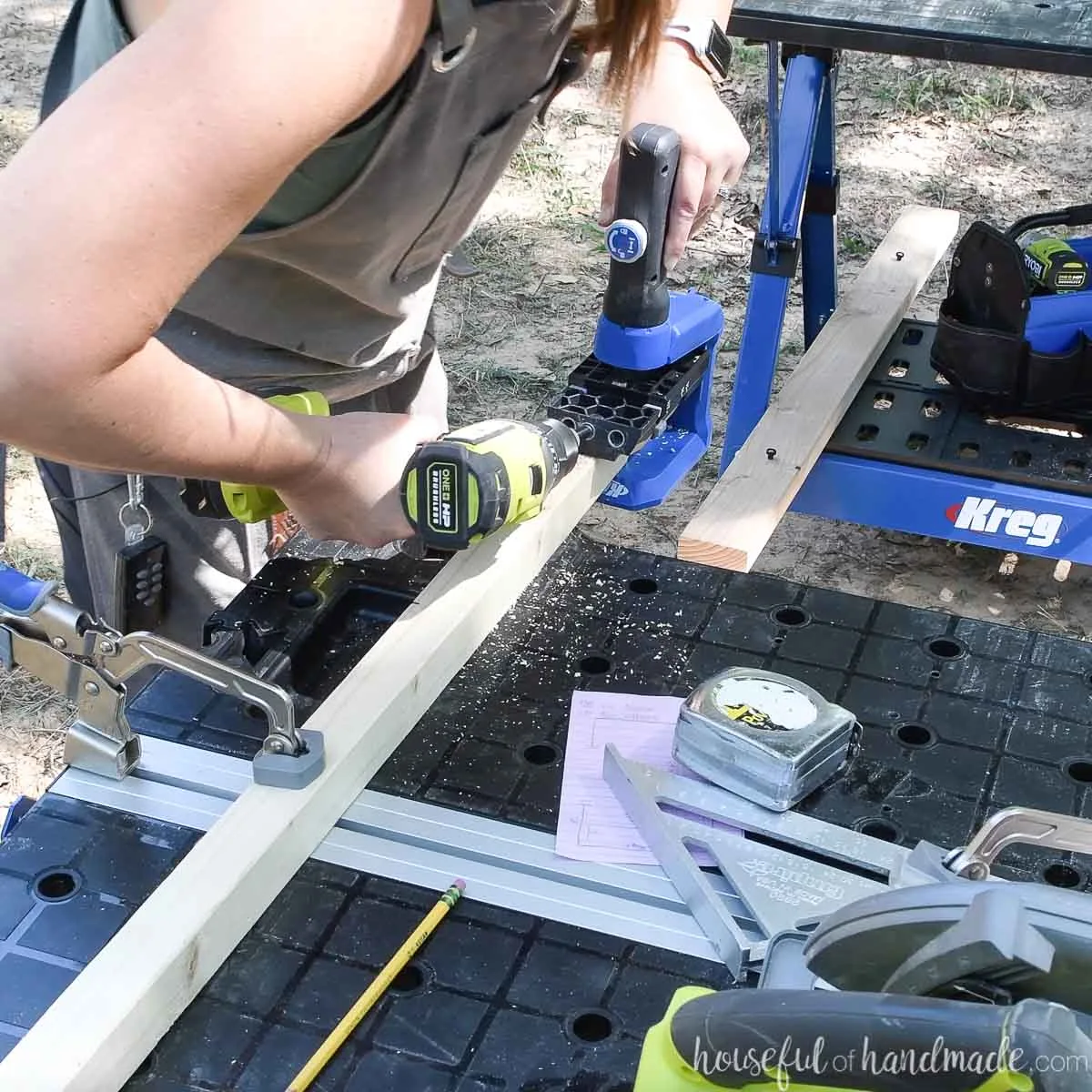 Adding pocket holes to the end of a 2x2 board outside on a mobile project table. 