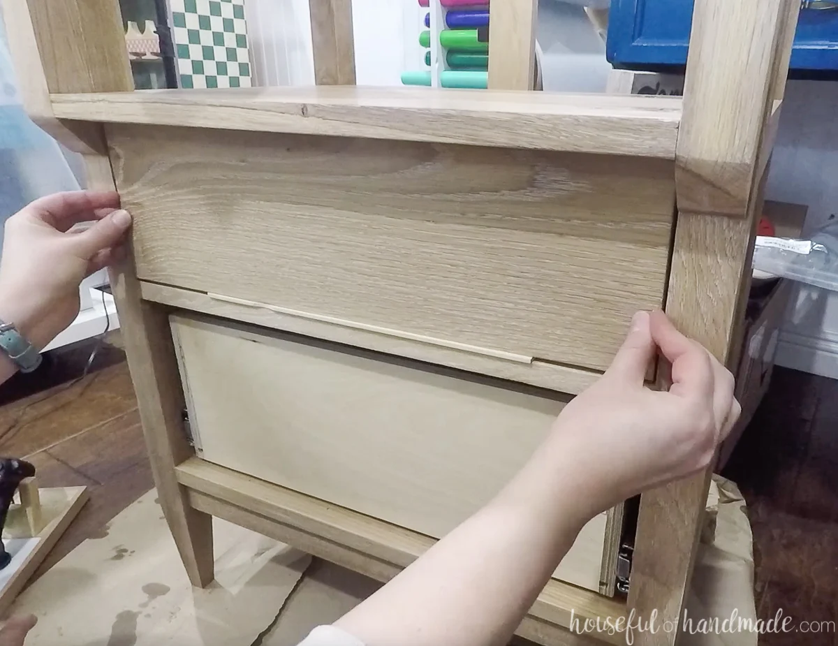 Lining up an inset drawer front with a small wood space. 