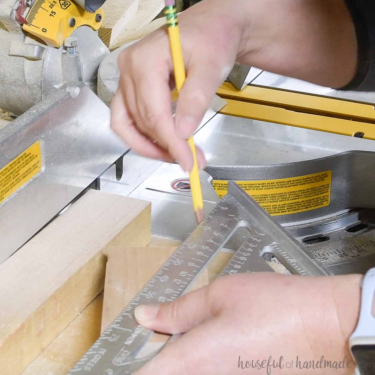 Drawing a diagonal line on the top of the block.