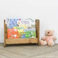 Easy to build toddler bookcase with picture books facing forward.