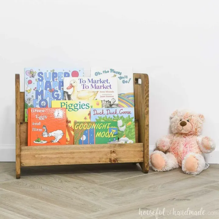 Easy to build toddler bookcase with picture books facing forward.