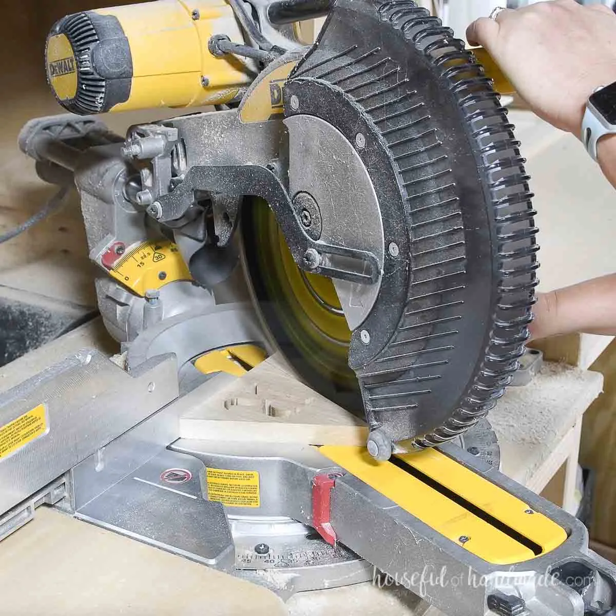 Cutting a triangle with a miter saw.