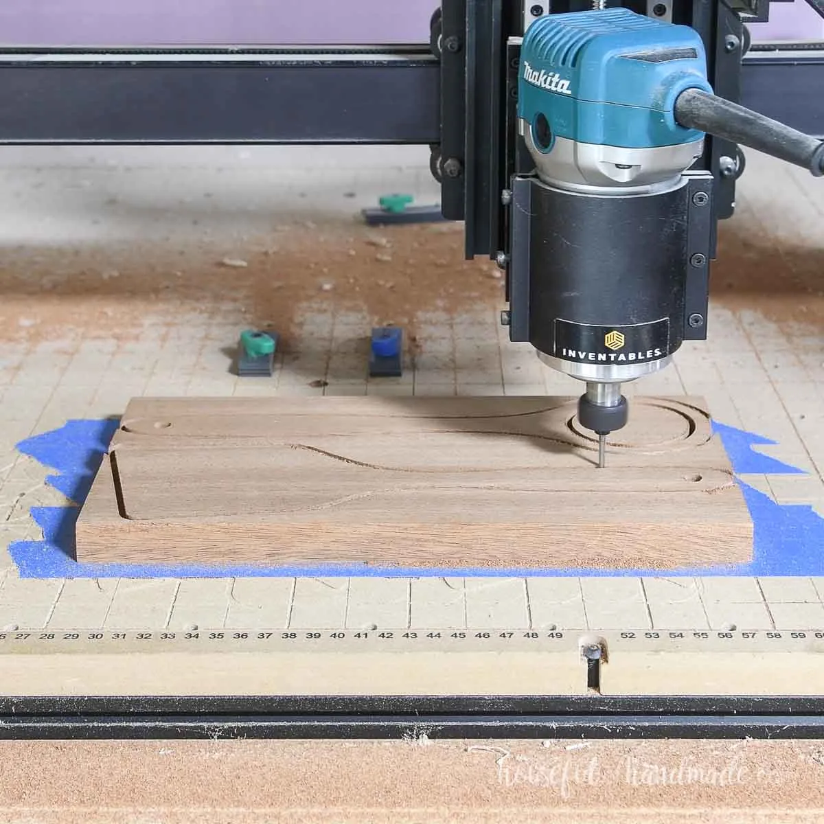 Cutting out a wood whisk and spatula with a CNC machine. 