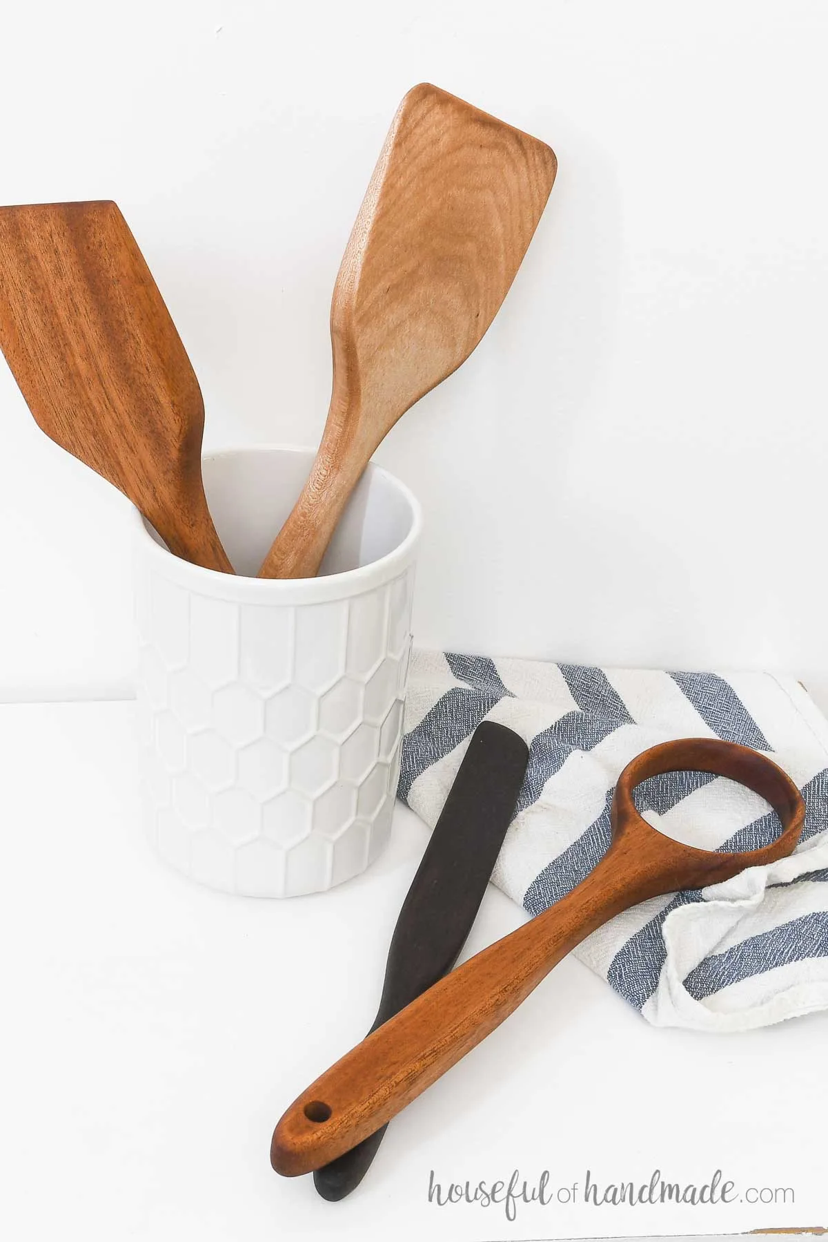 Wood kitchen utensils made with a jigsaw and sander. 