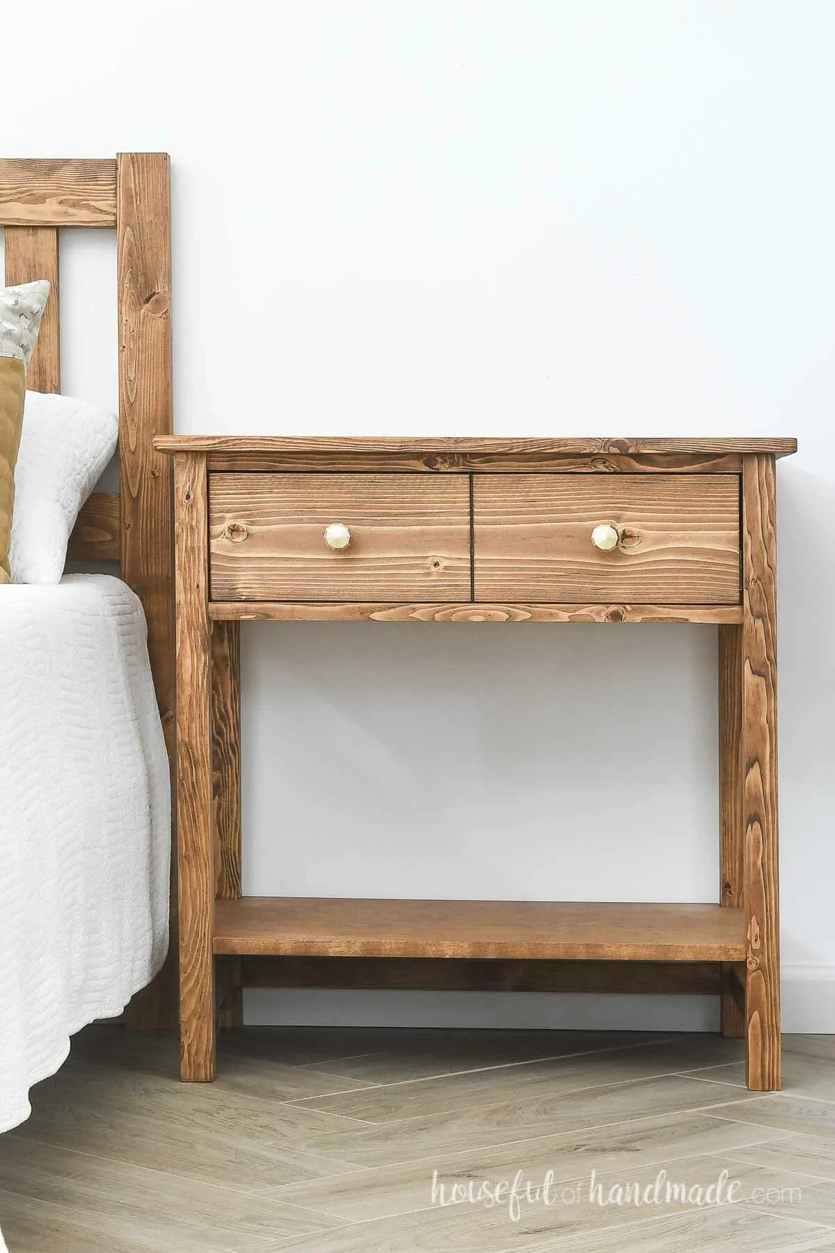 Large nightstand with one drawer and gold drawer pulls. 