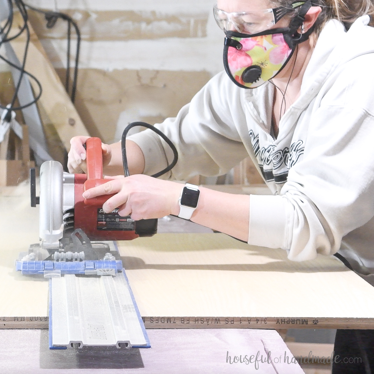 Cutting plywood with a circular saw and AccuCut guide.