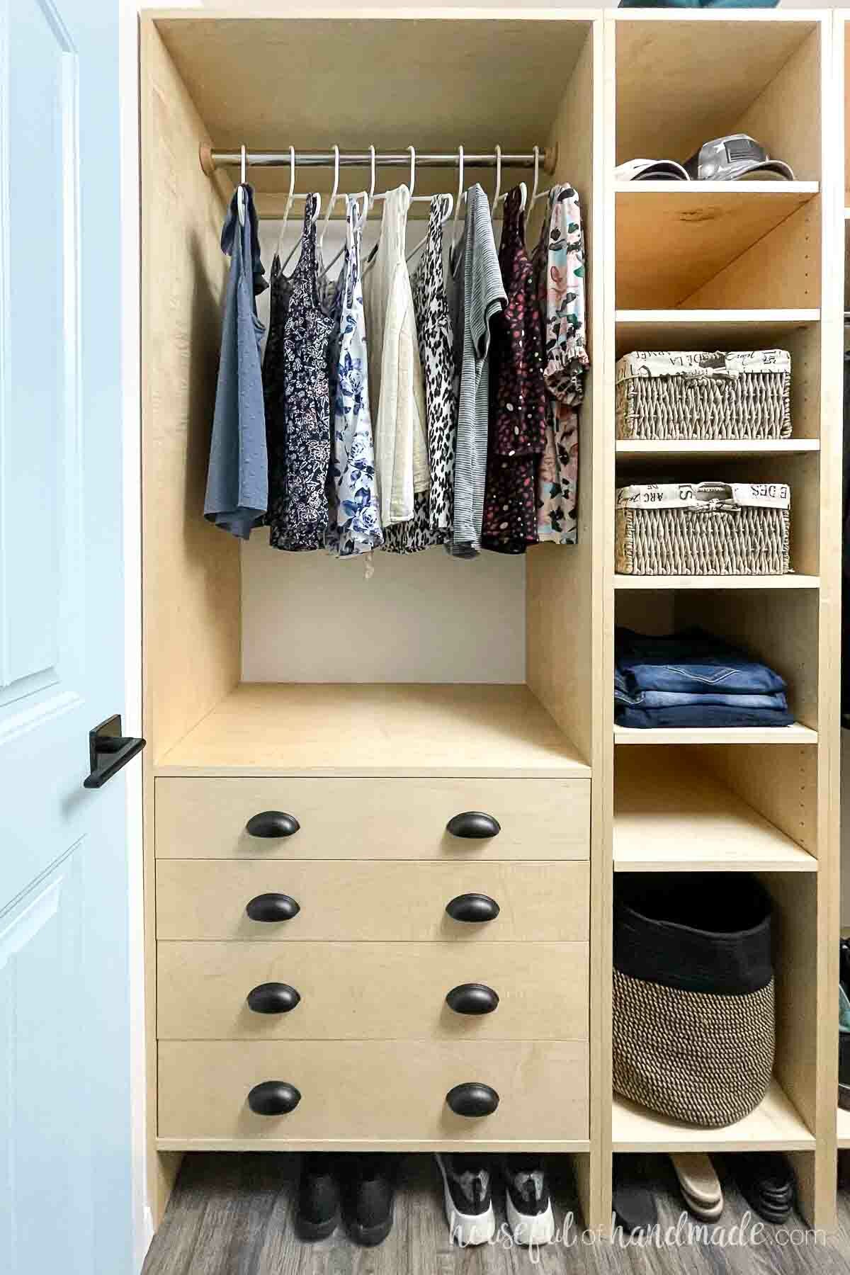 Two sections of the closet organizer cabinets, one with 4 large drawer and a closet rod and the other with lots of shelves. 