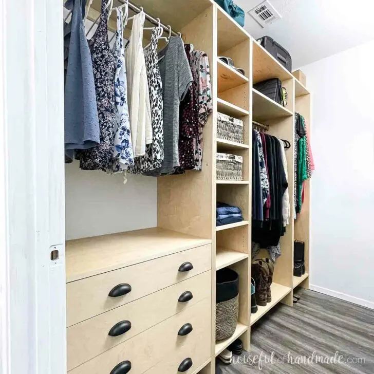 DIY custom closet organizer built from 4 cabinet sections.