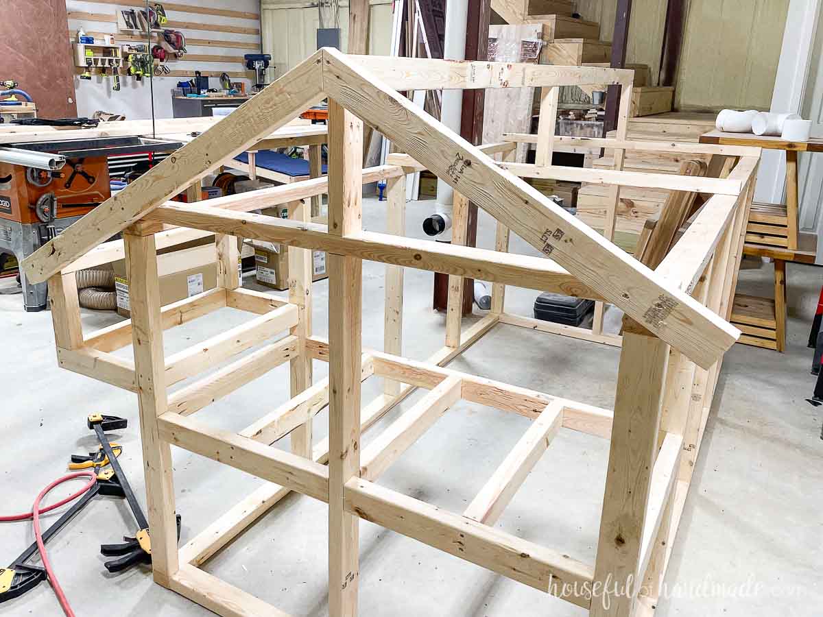 Attaching roof rafters to the front and back of the run frame. 